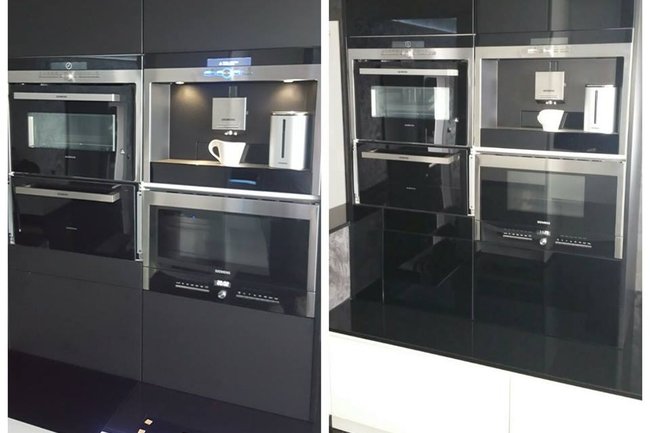 Bestaande keuken renovatie d.m.v. zwart gespoten glas.
