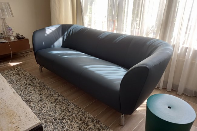 Leolux marine leder herstoffering