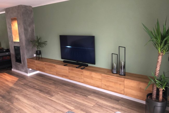 Ontwerp en realisatie voor opbergruimte en ombouw openhaard