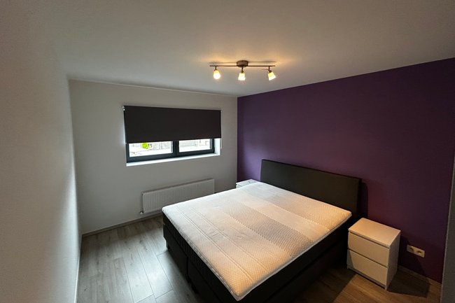 Accentmuur in slaapkamer te Oud - Turnhout