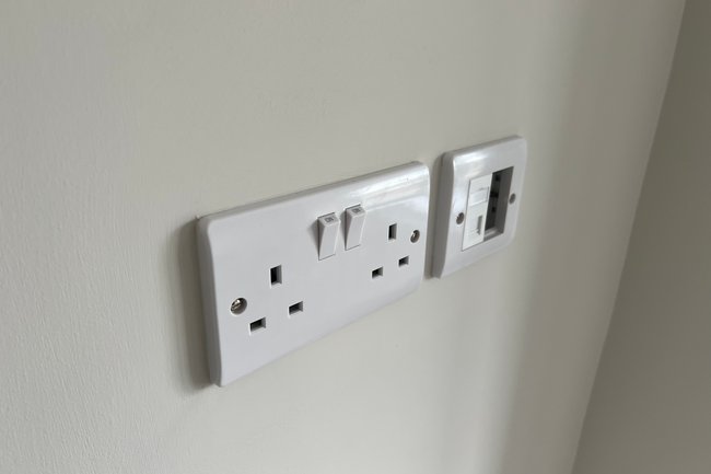 Up close of a socket neatly painted around