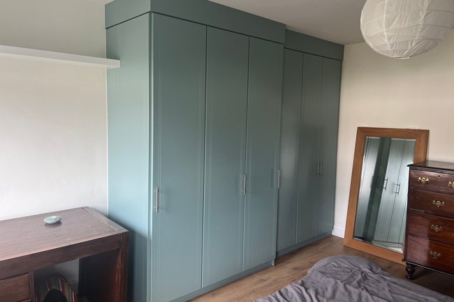 Wardrobe restored from old wood to new looking green