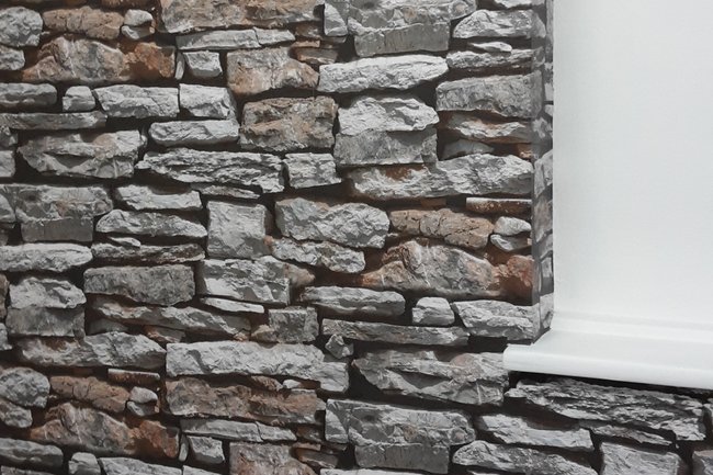 Lining paper then Moroccan stone wallpaper.