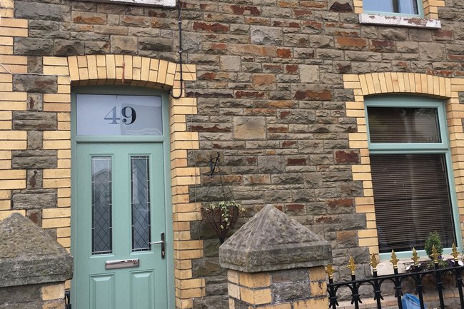 Chartwell Green composite door & REHAU windows