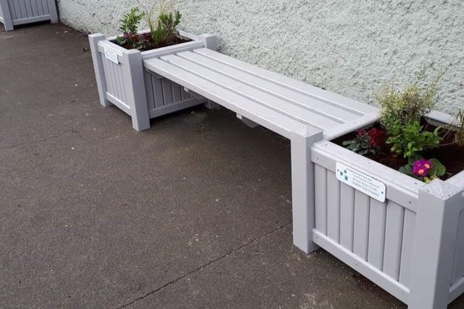 Outdoor seating with planter boxes