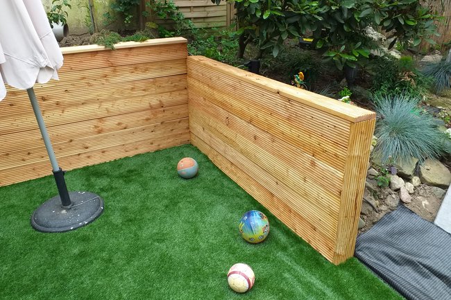 bestrating, bielsen keerwand en kunstgras in Elten