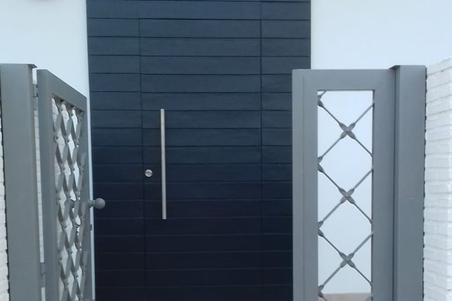Updated paint job from previous natural wood finish to grey.