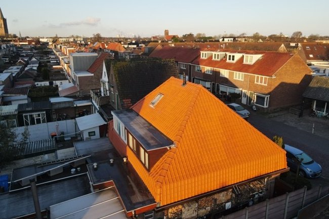 Complete pannendak renovatie met tule de nord natuurrood
