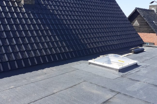 Renovatie plat dak en hellend dak