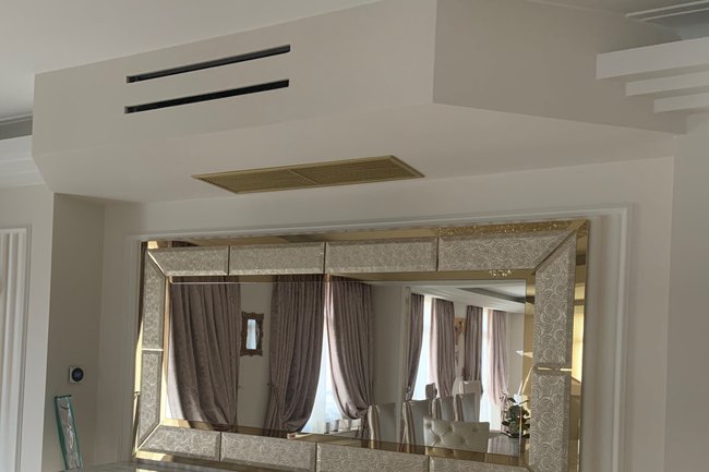 Inbouwtoestel Daikin FBA 60 met aanzuigrooster in goud