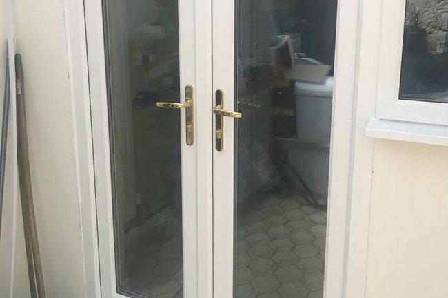 White REHAU uPVC French Doors and Flag Window