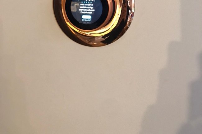 Copper finish nest thermostat with suited backing plate