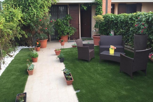 Realizzazione di un Giardino con Prato Sintetico