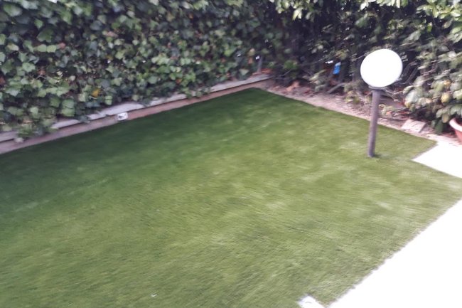 Realizzazione di un Giardino con Prato Sintetico