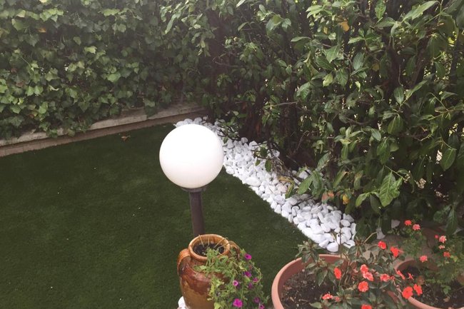 Realizzazione di un Giardino con Prato Sintetico