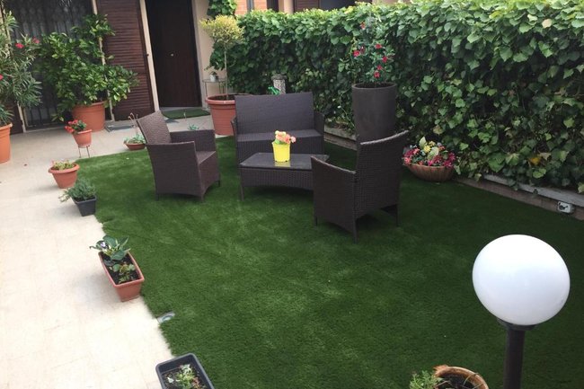 Realizzazione di un Giardino con Prato Sintetico
