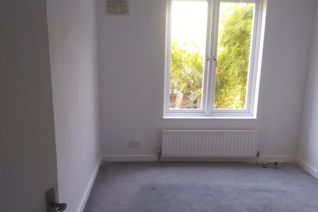 Repainted bedroom from grey to white, fresh new look.