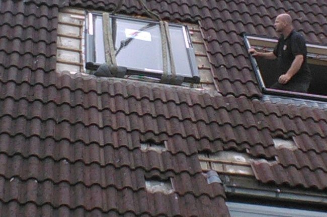 Dakramen met de kraan monteren