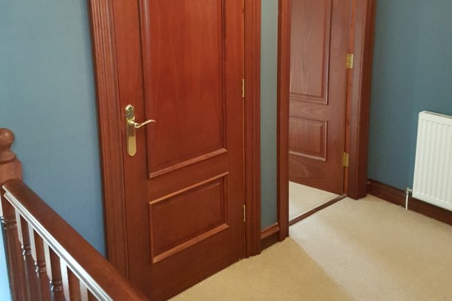Redecor of hall includes oiling of woodwork and doors