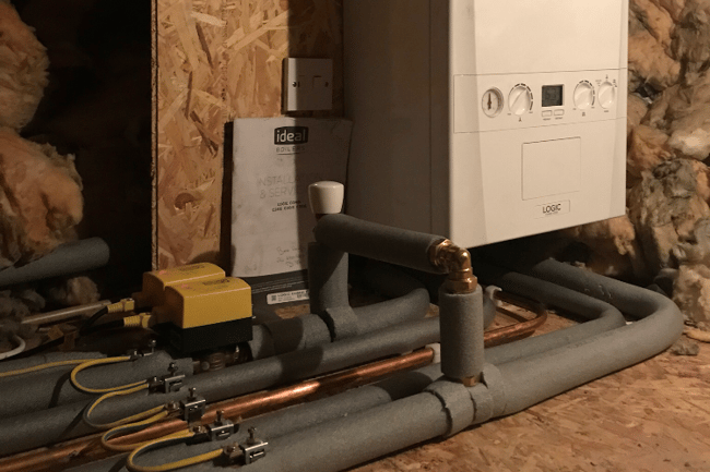 New combi Gas boiler to attic giving instantaneous hot water