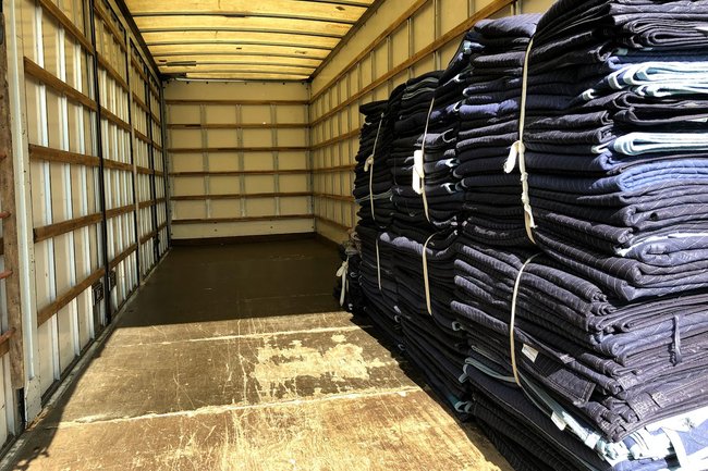 Clean truck, neatly folded blankets ready for the next job!