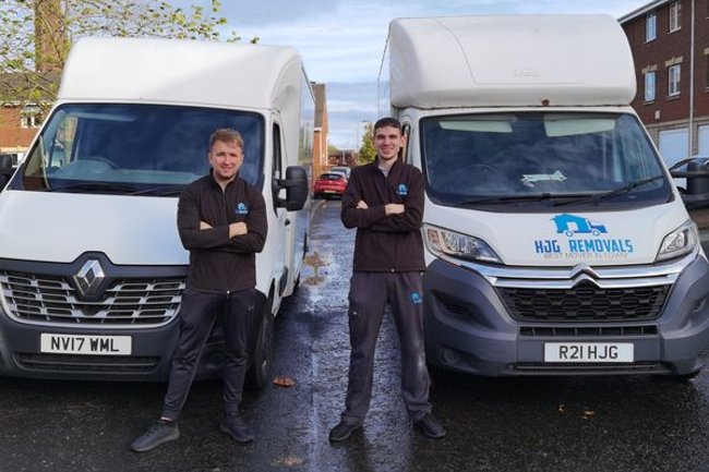 Hayden and Ronnie after completing a house move in Paisley.