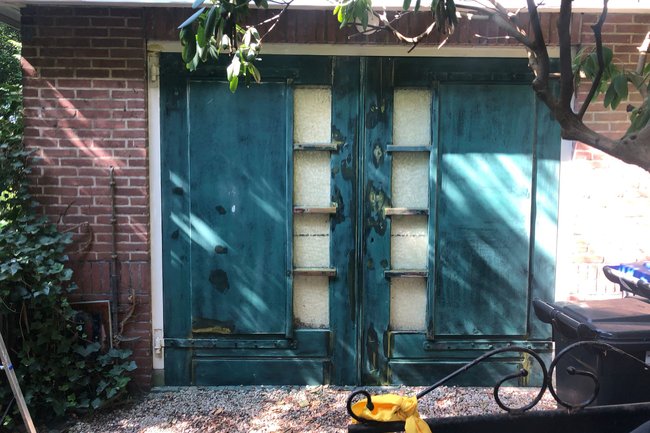 Reparatie werk garage deur