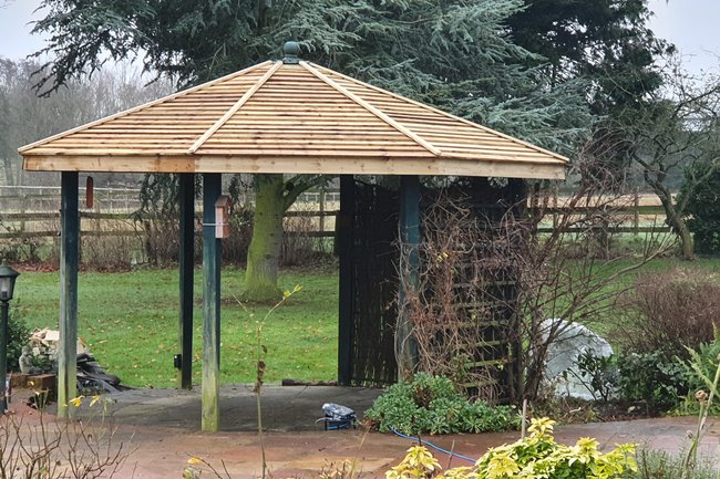 Roof replaced with green feather edge.