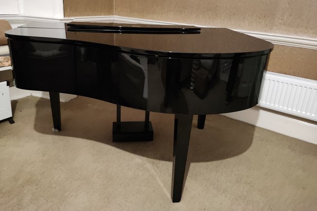 Luxury piano, with a delicate wrapping package included!