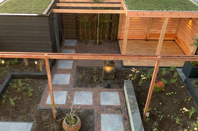 Complete tuininrichting , buitenverblijf met Sedumdak