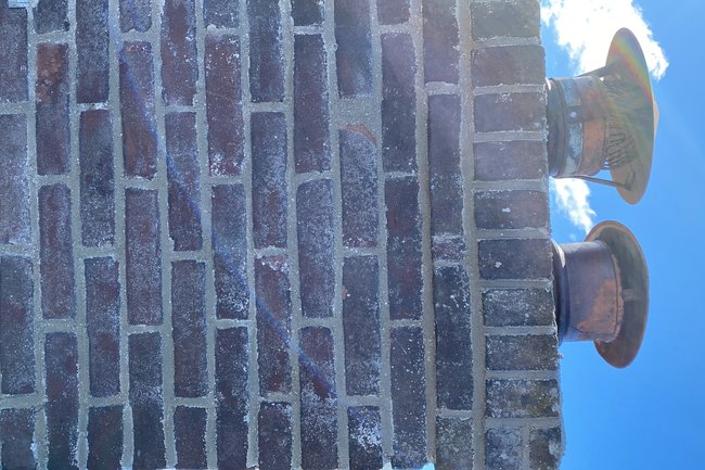 Schoorsteen op nieuw in de voeg plus nieuw lood