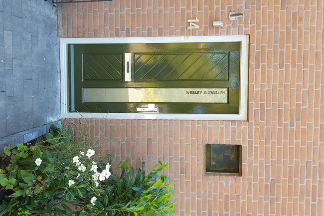 Hoogglans deur met producten van sigma coatings